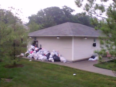 Cell Phone Shot Of Overflowing Garbage Avalon Gardens Nanuet Ny